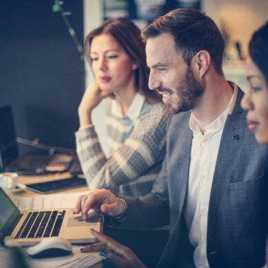 Business people working together in office.