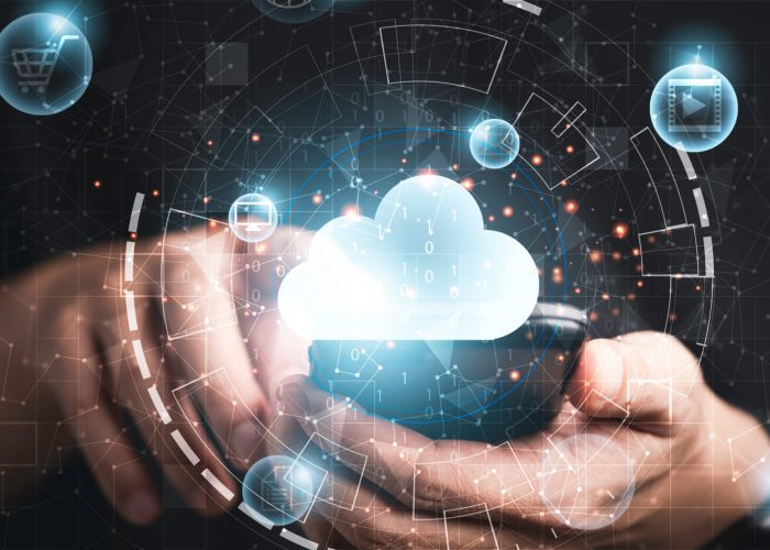 Businessman using smartphone with virtual cloud computing technology transformation and internet of thing. Cloud technology management big data include business strategy , customer service.